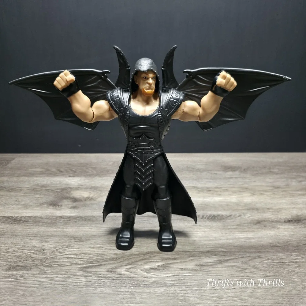 2014 Mattel WWE The Undertaker with Pop Up Black Wings 12